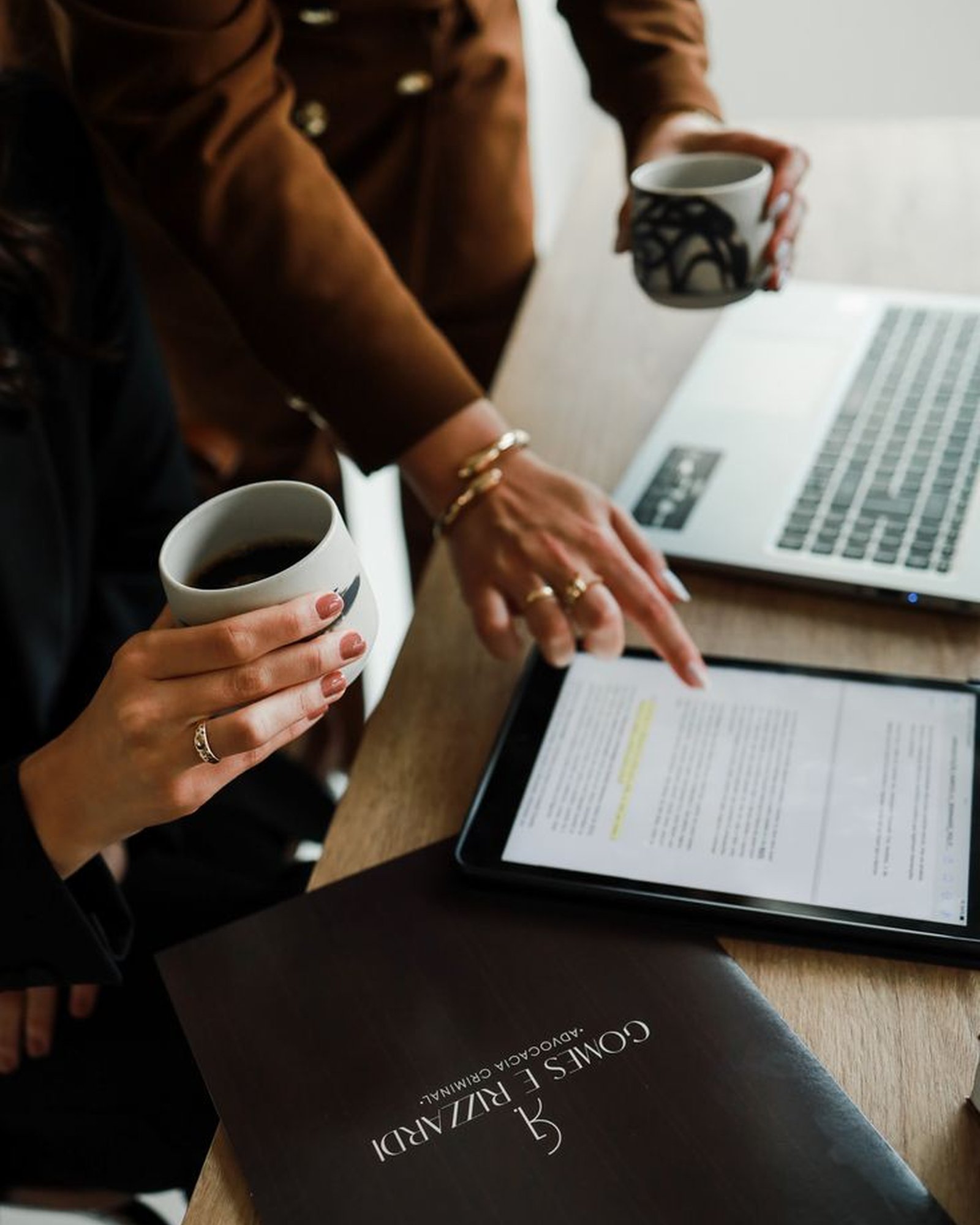 Two operators reviewing strategy together over coffee